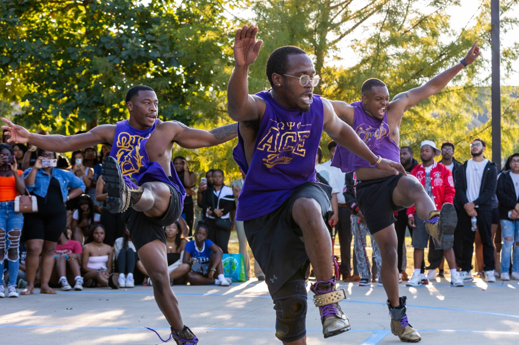 Three students performing at the NPHC Yard Show
